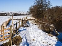 River breach at Bampton affecting local footpath